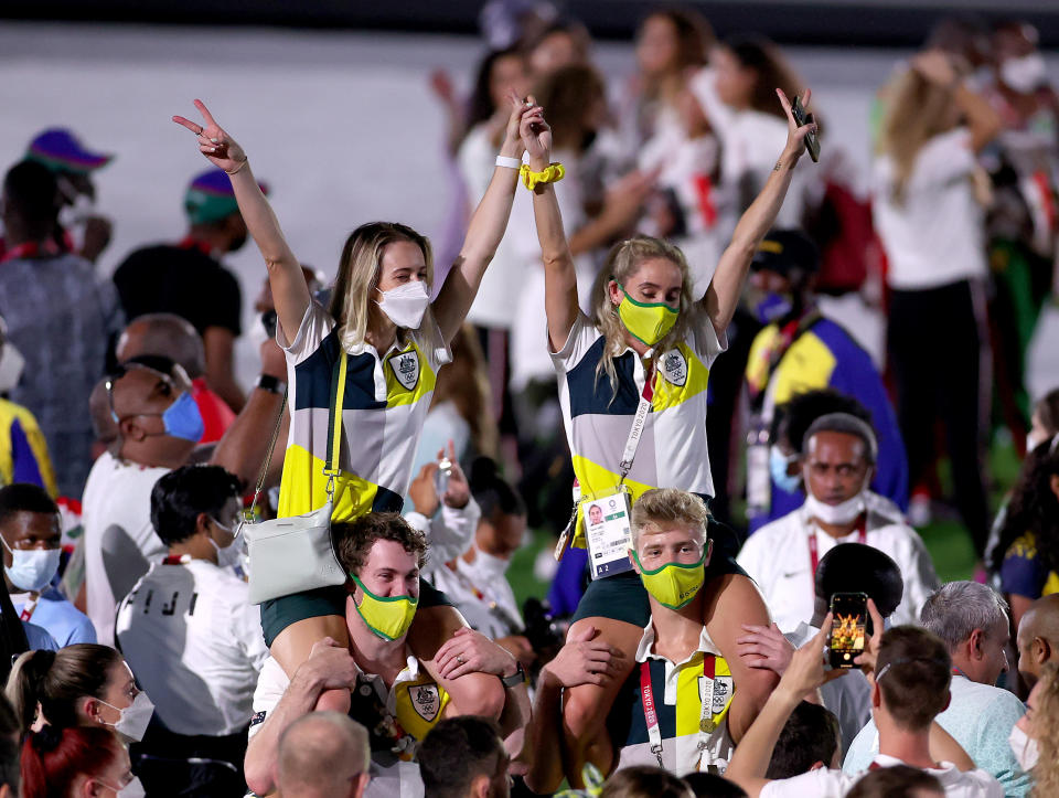 TOKYO, JAPAN - AUGUST 08: Members of Team Australia celebrate during the Closing Ceremony of the Tokyo 2020 Olympic Games at Olympic Stadium on August 08, 2021 in Tokyo, Japan. (Photo by David Ramos/Getty Images)