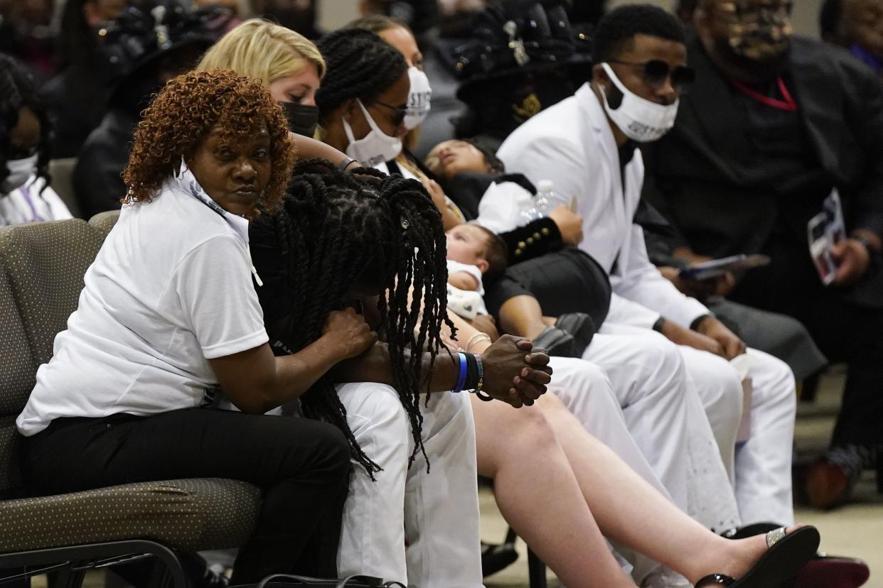 Family members attend the funeral for Andrew Brown Jr.