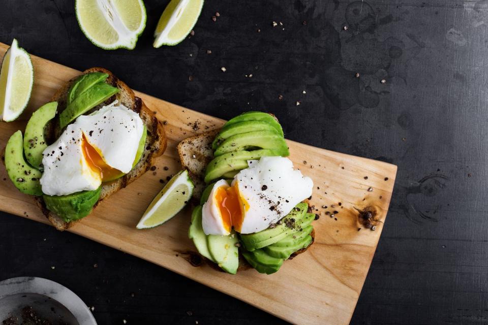 sandwich with poached egg and sliced avocado for good housekeeping's best high calorie snack