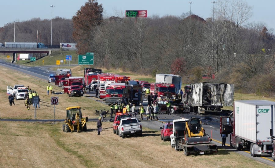 Both directions of Interstate 70 are closed in Licking County, Ohio, near the State Route 310 interchange after a fatal accident on Tuesday, Nov. 14, 2023. A charter bus carrying students from a high school was rear-ended by a semi-truck on the Ohio highway. (Barbara Perenic /The Columbus Dispatch via AP)