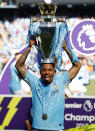 <p>Soccer Football – Premier League – Manchester City vs Huddersfield Town – Etihad Stadium, Manchester, Britain – May 6, 2018 Manchester City’s Gabriel Jesus celebrates with the trophy after winning the Premier League title REUTERS/Phil Noble EDITORIAL USE ONLY. No use with unauthorized audio, video, data, fixture lists, club/league logos or “live” services. Online in-match use limited to 75 images, no video emulation. No use in betting, games or single club/league/player publications. Please contact your account representative for further details. </p>
