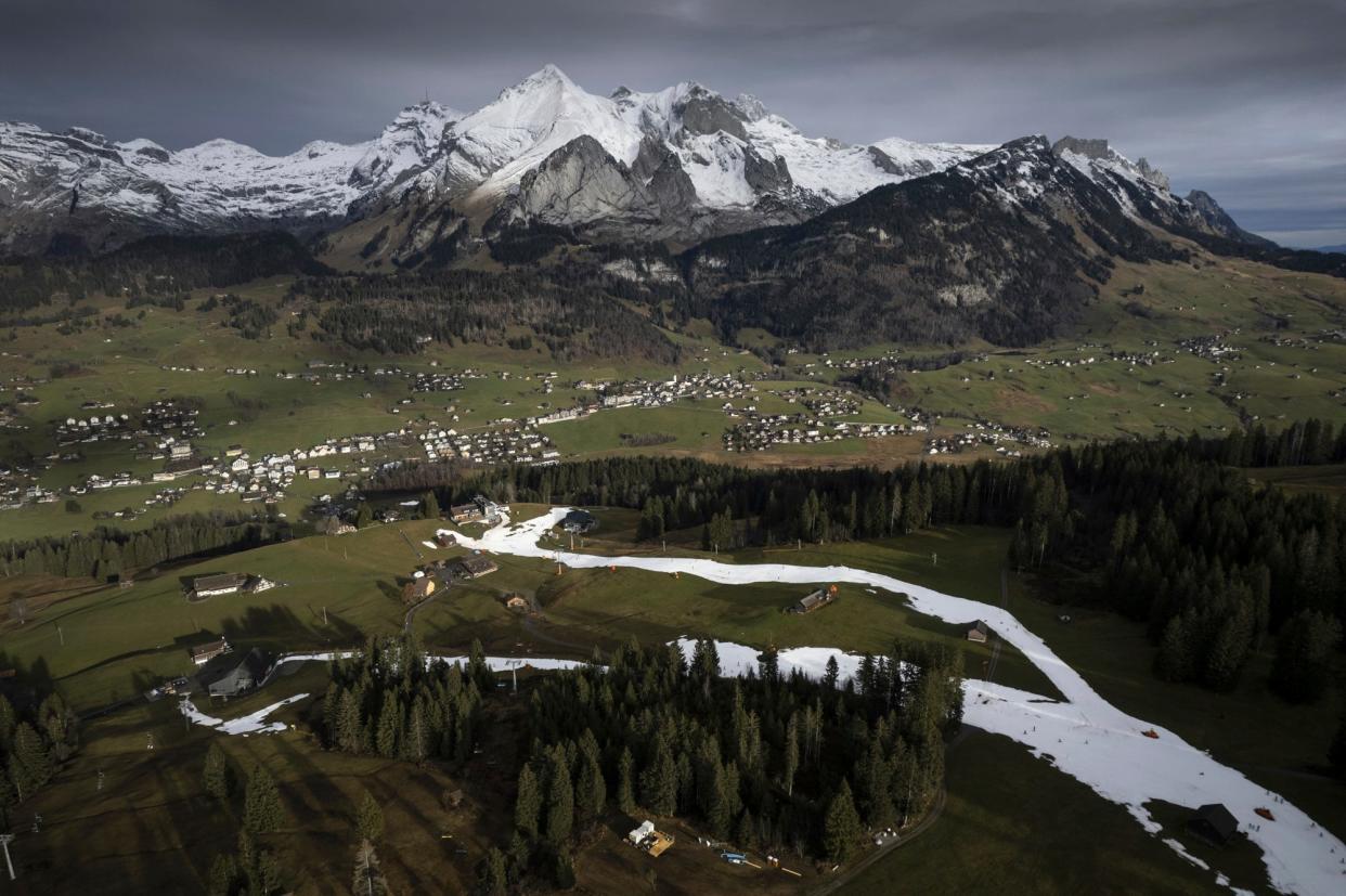 This photo from January depicts an artificial snow slope created for skiers in Wildhaus, Switzerland. The Swiss alps are confronted with a lack of snow and warm temperatures.