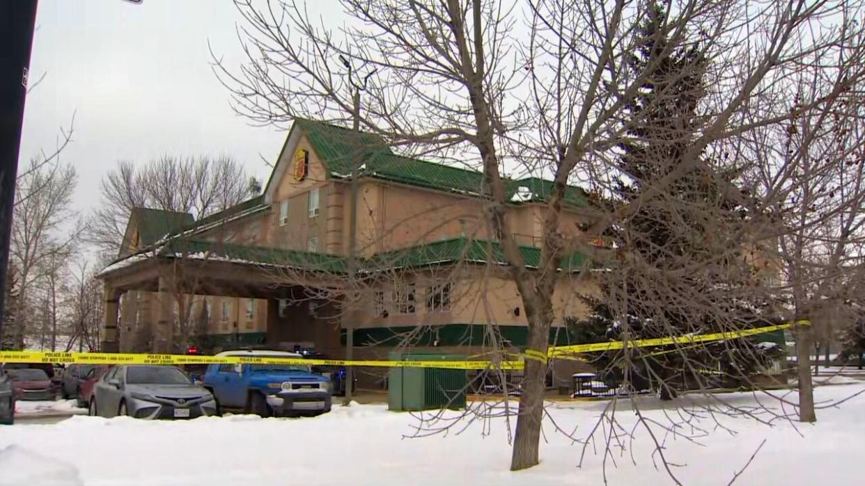 Calgary police responded to a report of a shooting on Monday at this Super 8 hotel on Shawville Road S.E. A man was found dead at the scene. (Rebecca Hunt/CBC - image credit)