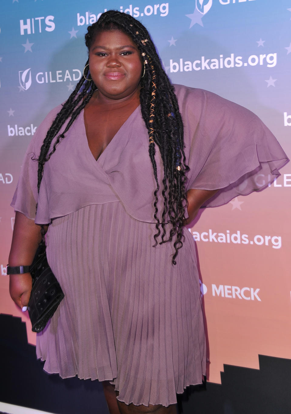 Gabourey Sidibe wearing purple