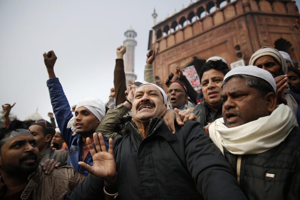 Indians shout slogans as they gather for a protest against the Citizenship Amendment Act after Friday prayers outside Jama Masjid in New Delhi, India, Friday, Dec. 20, 2019. Police banned public gatherings in parts of the Indian capital and other cities for a third day Friday and cut internet services to try to stop growing protests against a new citizenship law that have so far left eight people dead and more than 1,200 others detained. (AP Photo/Altaf Qadri) in New Delhi, India, Friday, Dec. 20, 2019. (AP Photo/Altaf Qadri)