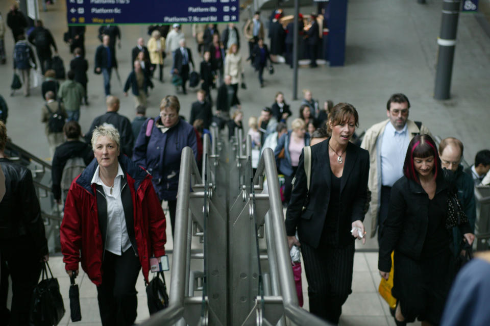 Rush hour at Leeds station as travellers ascend the station overbridge. May 2005, United Kingdom. (Photo by Rail Photo/Construction Photography/Avalon/Getty Images)