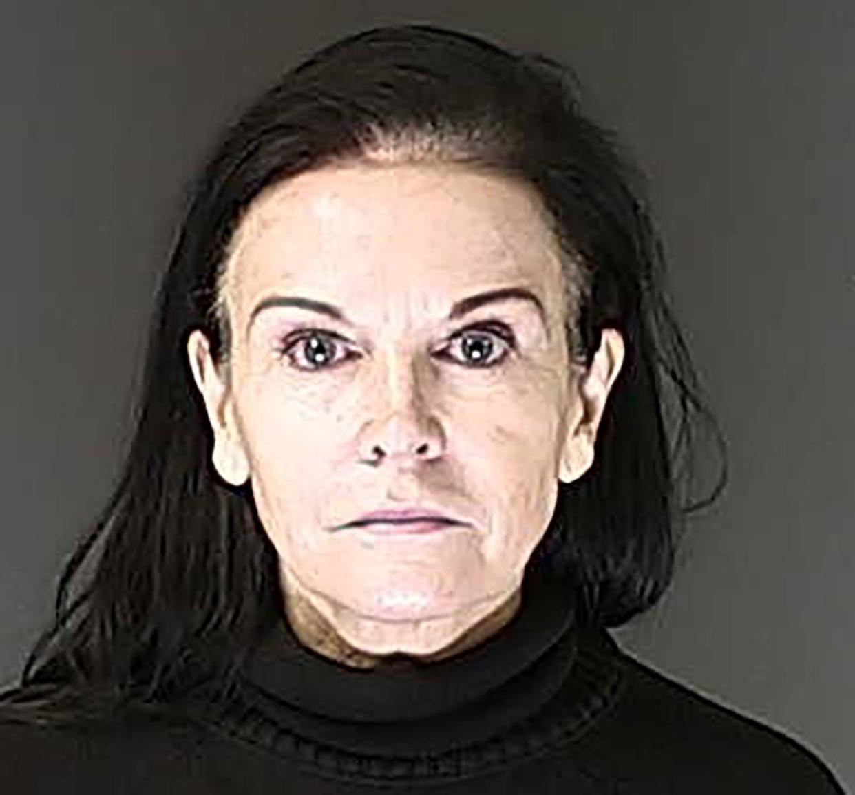 This undated file photo provided by the El Paso County, Colo., Sheriff's Office shows Carla Faith, a Colorado woman charged with hiding 26 children behind a false wall at her day care center. 