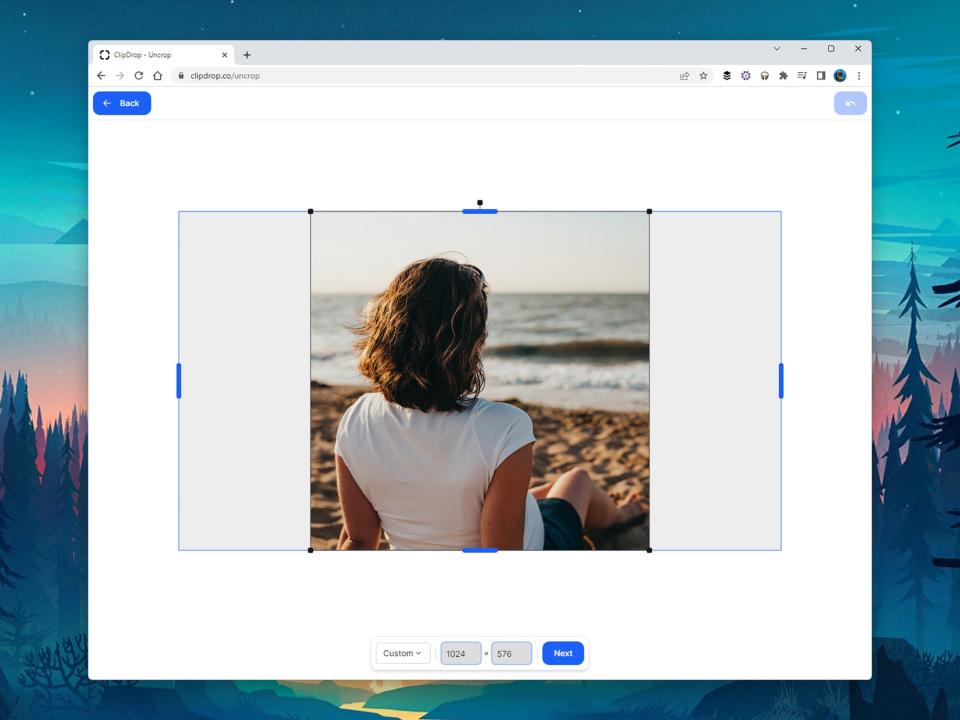 Using Clipdrop's Uncrop AI image extender tool to expand the left and right edges of a photo of a woman with shoulder-length brown hair sitting on a beach in a white t-shirt and black shorts.