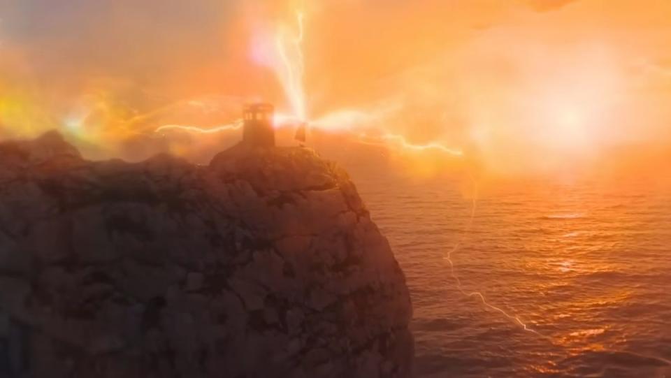 thirteenth doctor regenerates on a cliff overlooking the ocean in front of the tardis