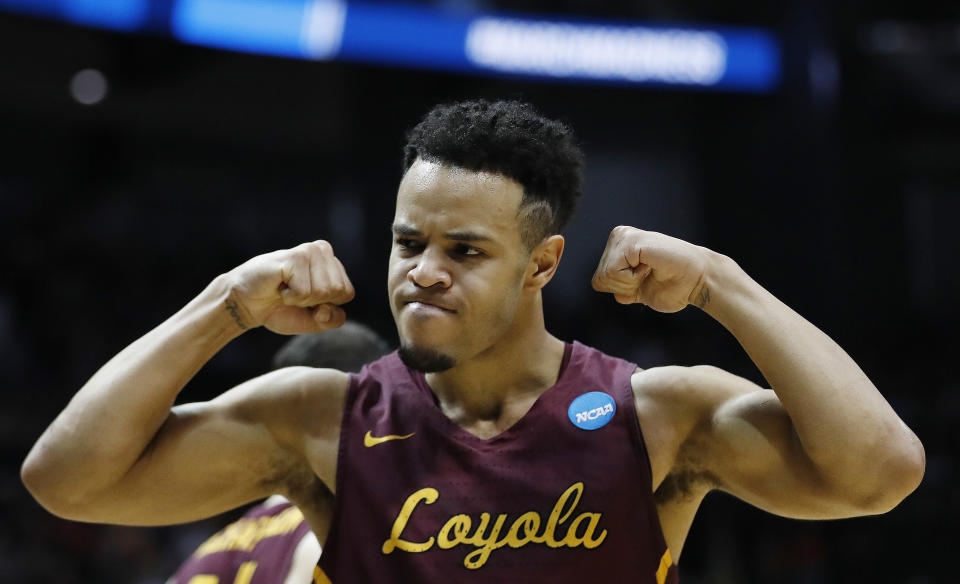 Loyola-Chicago guard Marques Townes (5) celebrates a shot against Kansas State during the second half of a regional final NCAA college basketball tournament game, Saturday, March 24, 2018, in Atlanta. Loyola-Chicago won 78-62. (AP Photo/David Goldman)