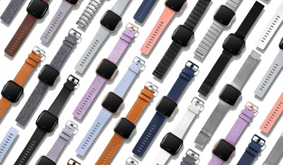 Collection of Fitbit Versas with different watchbands