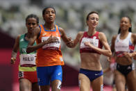 Sifan Hassan, of the Netherlands, crosses the finish line to win her heat of the women's 1,500-meters at the 2020 Summer Olympics, Monday, Aug. 2, 2021, in Tokyo. (AP Photo/Petr David Josek)