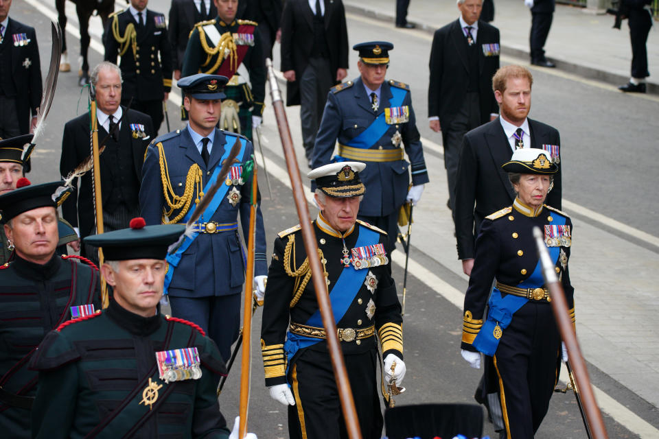 (left to right) The Prince of Wales, King Charles III, the Princess Royal and the Duke of Sussex following the State Gun Carriage carries the coffin of Queen Elizabeth II, draped in the Royal Standard with the Imperial State Crown and the Sovereign's orb and sceptre, in the Ceremonial Procession during her State Funeral at Westminster Abbey, London. Picture date: Monday September 19, 2022. (Photo by Peter Byrne/PA Images via Getty Images)