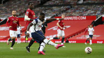 Tottenham's Serge Aurier scores his side's fifth goal during the English Premier League soccer match between Manchester United and Tottenham Hotspur at Old Trafford in Manchester, England, Sunday, Oct. 4, 2020.(Alex Livesey/Pool via AP)