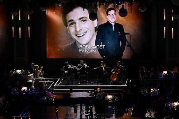 PHOTO: Late actor Bob Saget is seen onscreen during an In Memoriam segment performed by John Legend onstage during the 74th Emmy Awards at the Microsoft Theater in Los Angeles, on Sept. 12, 2022. (Patrick T. Fallon/AFP via Getty Images)