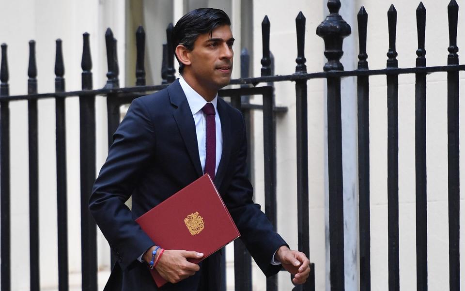 Rishi Sunak on his way to present the government's "winter economy plan" - Justin Tallis/AFP