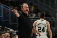 Milwaukee Bucks head coach Mike Budenholzer reacts during the first half of an NBA basketball game against the Charlotte Hornets Wednesday, Dec. 1, 2021, in Milwaukee. (AP Photo/Morry Gash)