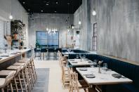 This winter, imbibe on Greek wines and feast on Aegean small plates in an intimate, high design setting at newcomer <a href="https://krasiboston.com" rel="nofollow noopener" target="_blank" data-ylk="slk:Krasi Meze & Wine" class="link rapid-noclick-resp">Krasi Meze & Wine</a> in <a href="https://www.cntraveler.com/gallery/best-restaurants-in-boston?mbid=synd_yahoo_rss" rel="nofollow noopener" target="_blank" data-ylk="slk:Boston’s" class="link rapid-noclick-resp">Boston’s</a> Back Bay. At <a href="https://thedialcentralsq.com" rel="nofollow noopener" target="_blank" data-ylk="slk:The Dial" class="link rapid-noclick-resp">The Dial</a> in Cambridge, noted chef Justin Urso serves dishes including moqueca (a Brazilian shellfish stew), Caribbean-inspired jerk quail, buñuelos (Colombian cheese fritters), and kinilaw (coconut rich, Filipino ceviche). For Boston’s freshest raw selections—not to mention the city’s best lobster roll—we recommend the tried-and-true <a href="https://www.row34.com/boston/" rel="nofollow noopener" target="_blank" data-ylk="slk:Row 34" class="link rapid-noclick-resp">Row 34</a>. And for a fun night of tiki drinks and superb Asian small plates, reserve in advance at <a href="https://www.cntraveler.com/restaurants/boston/uni?mbid=synd_yahoo_rss" rel="nofollow noopener" target="_blank" data-ylk="slk:Uni" class="link rapid-noclick-resp">Uni</a>, a contemporary izakaya helmed by Tony Messina, a James Beard Best Chef winner.