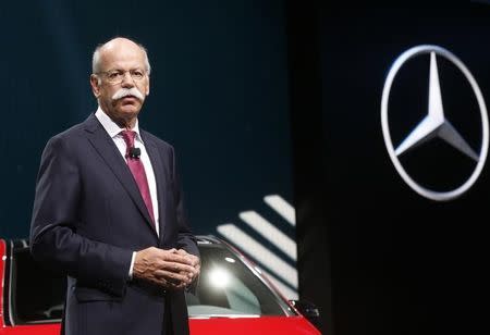 Chairman of Daimler AG and Head of Mercedes-Benz cars Dieter Zetsche attends a news conference on media day at the Paris Mondial de l'Automobile, October 2, 2014. REUTERS/Jacky Naegelen