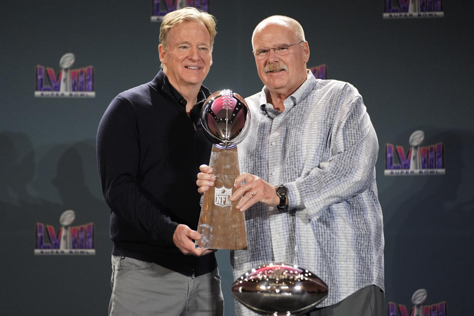 Kansas City Chiefs head coach Andy Reid, right, poses with NFL commissioner Roger Goodell during a news conference following the Super Bowl 58 NFL football game Monday, Feb. 12, 2024, in Las Vegas. (AP Photo/John Locher)