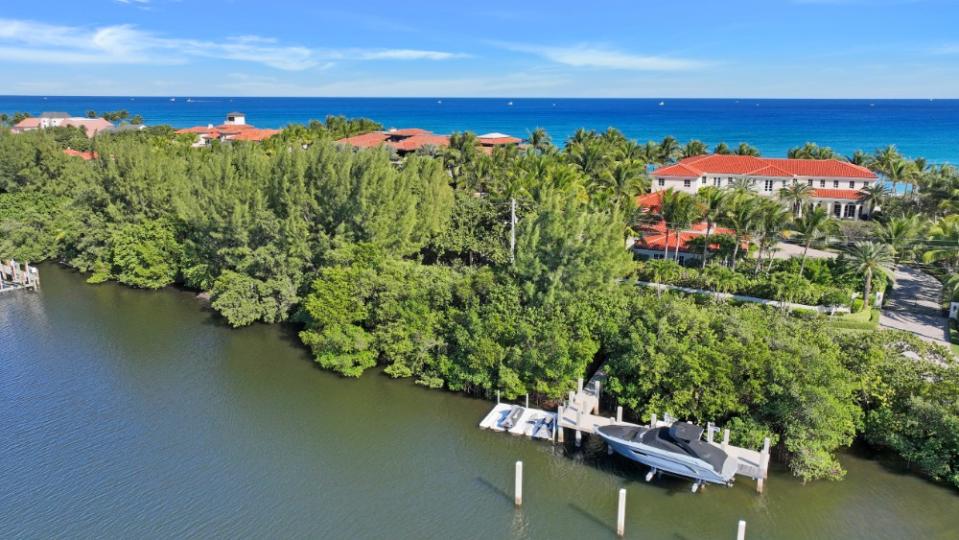 The private dock can accommodate a 20,000-pound boat. - Credit: Cliff Finley, Picture It Sold Photography