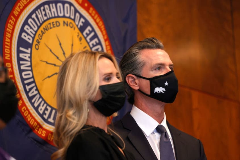 Gavin Newsom and his wife Jennifer Siebel Newsom.