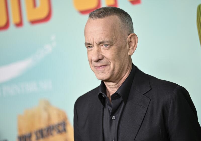 Tom Hanks in black suit at the premiere of "Asteroid City" at Alice Tully Hall on Tuesday, June 13, 2023, in New York