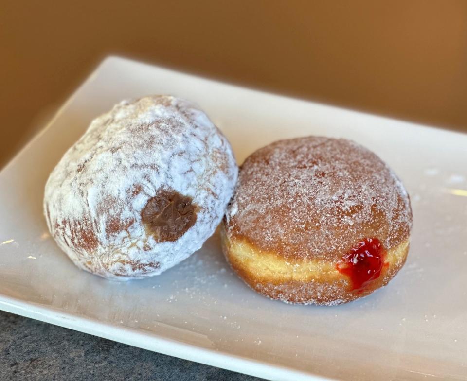 Manderfield's Home Bakery has added a chocolate crème paczki, left, to its 2023 lineup of flavors for Fat Tuesday. The bakery operates two stores in Appleton and one in Menasha.