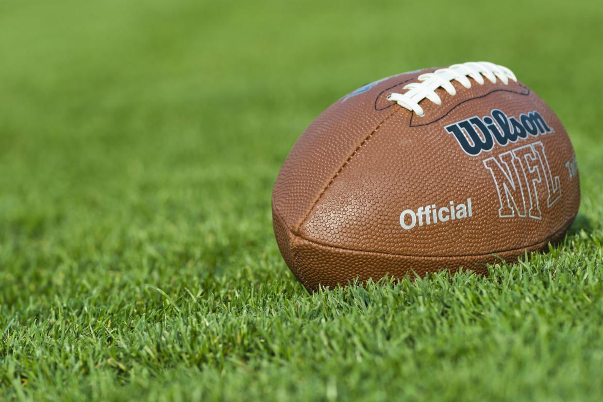 Iasi, Romania - September 20, 2012:  Wilson NFL Trakified American Football ball, on the field