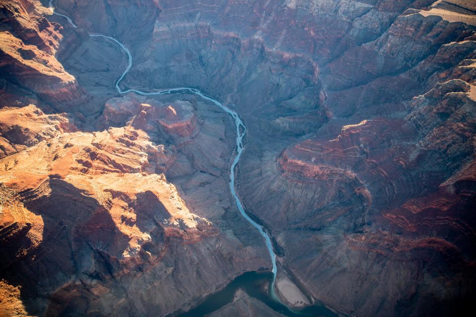 A view of the confluence of the Little Colorado River (above) and the Colorado River (below) in the Grand Canyon on Dec. 1, 2021.