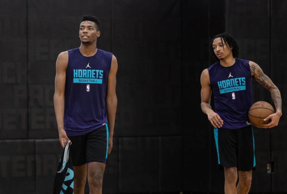 Hornets Brandon Miller, left and Nick Smith Jr. practice during the Charlotte Hornets Minicamp at Novant Health Training Center, N.C., on Friday, June 30, 2023.