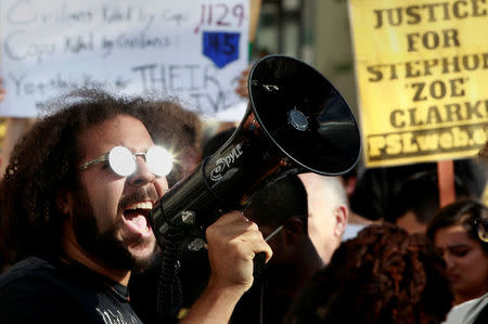 Protesters chant slogans during a march downtown after the funeral of police shooting victim Stephon Clark, in Sacramento, California, U.S. March 29, 2018. REUTERS/Bob Strong