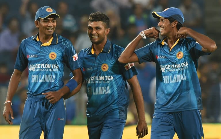 L-R: Sri Lanka's bowlers Dusmantha Chameera, Dasun Shanaka and Kasun Rajitha during the first T20 international match against India at the MCA International Cricket Stadium in Pune on February 9, 2016