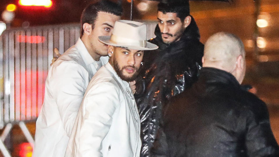 Neymar is pictured here heading into a Paris nightclub for his 28 birthday party celebrations.