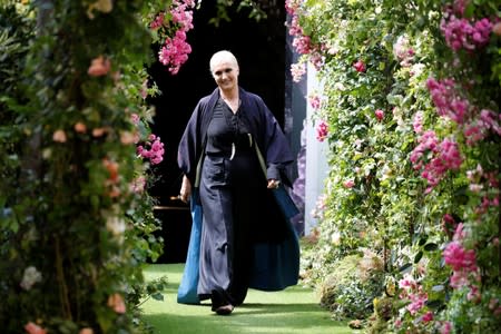 Designer Maria Grazia Chiuri appears at the end of her Haute Couture Fall/Winter 2019/20 collection show for fashion house Dior in Paris