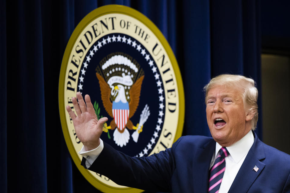 President Donald Trump waves during a summit on transforming mental health treatment to combat homelessness, violence, and substance abuse, at the he Eisenhower Executive Office Building on the White House complex in Washington, Thursday, Dec. 19, 2019, in Washington. (AP Photo/Manuel Balce Ceneta)