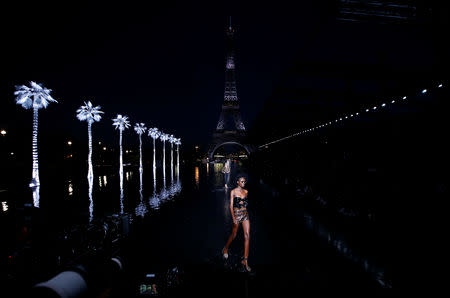 Models present creations by designer Anthony Vaccarello as part of his Spring/Summer 2019 women's ready-to-wear collection show for fashion house Saint Laurent during Paris Fashion Week in Paris, France, September 25, 2018. REUTERS/Stephane Mahe