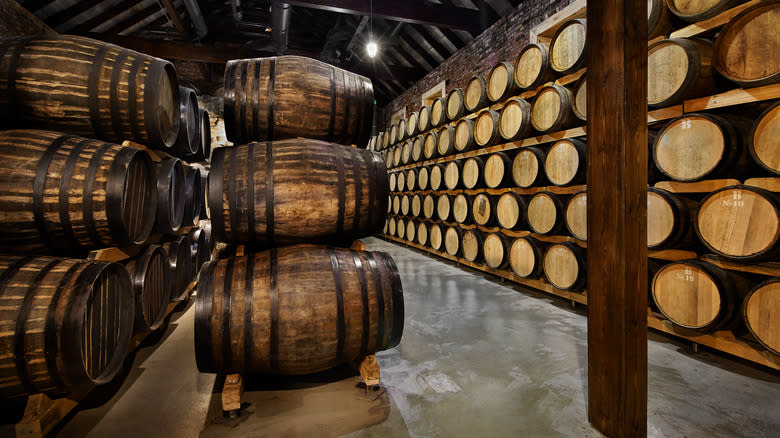 Rows of barrels at a distillery