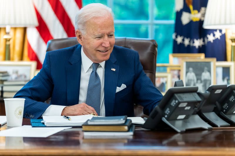 U.S. President Joe Biden speaks by phone with French President Macron from the White House in Washington