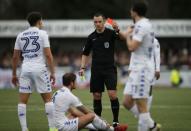 Britain Football Soccer - Sutton United v Leeds United - FA Cup Fourth Round - The Borough Sports Ground - 29/1/17 Leeds' Liam Cooper is shown a red card by referee Stuart Atwell Action Images via Reuters / Andrew Couldridge Livepic EDITORIAL USE ONLY. No use with unauthorized audio, video, data, fixture lists, club/league logos or "live" services. Online in-match use limited to 45 images, no video emulation. No use in betting, games or single club/league/player publications. Please contact your account representative for further details.