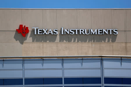 FILE PHOTO: A Texas Instruments Office is shown in San Diego, California, U.S., April 24, 2018. REUTERS/Mike Blake/File Photo