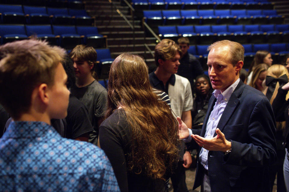 Minnesota Secretary of State Steve Simon talks to students after a Q&A with members of Voterama, a student group focused on voter advocacy and awareness at Breck School in Golden Valley, Minn. Friday, Dec. 1, 2023. (AP Photo/Nicole Neri)