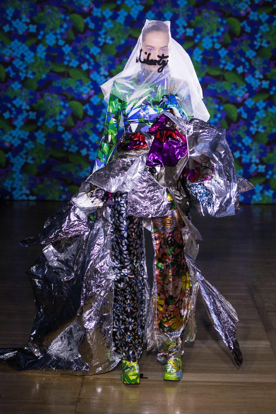 <p>Now, even we’d have to say that this is rather a lot of metallics for one look.<em> [Photo: Getty]</em> </p>