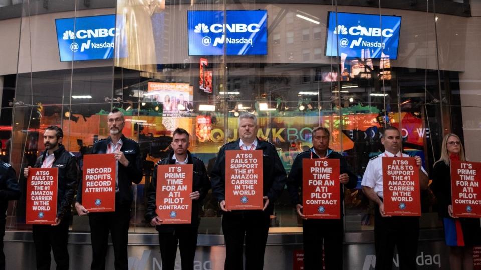 <em>Air Transport International pilots, including MEC Chairman Mike Sterling (center) picket outside the Nasdaq building in New York City during ATSG’s investor day on Sept. 29,</em> <em>2023. (Photo: ALPA)</em>