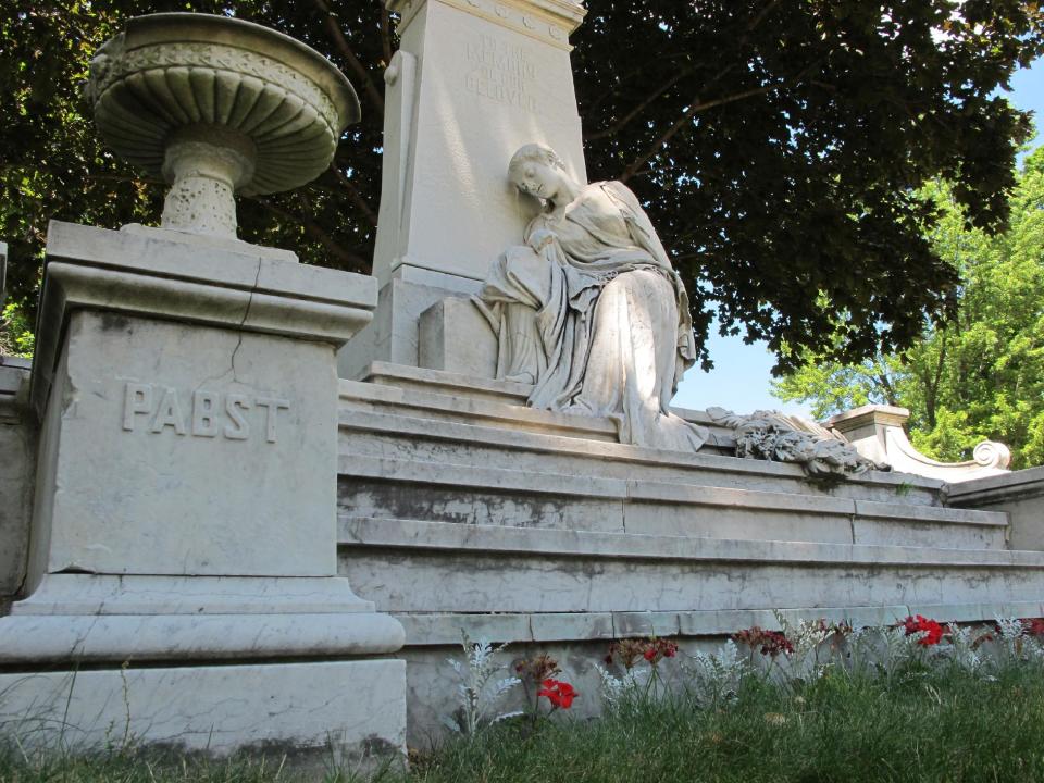 This June 21, 2012 photo shows the monument for the Pabst family of Pabst Brewing Co. at Forest Home Cemetery in Milwaukee. The cemetery, in the heart of Milwaukee's south side, lists six beer barons, including Jacob Best who founded Pabst Brewery, Pabst's namesake Frederic Pabst, and Valentin Blatz, who produced Blatz beer until it was sold to Pabst Brewing Co in 1959. (AP Photo/Carr?ie Antlfinger?)