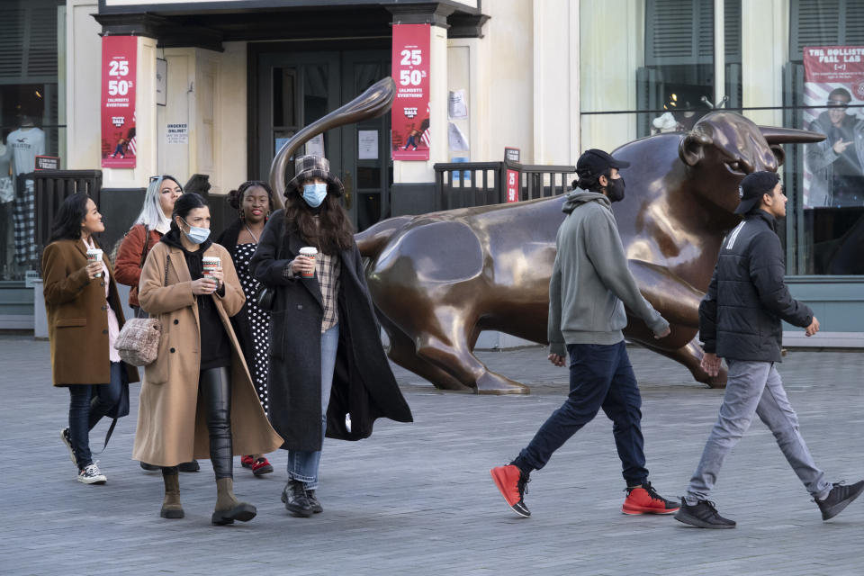 People wearing face masks in the Bull Ring shopping area in the City Centre on the day it was announced that Birmingham would be placed in tier three for very high alert level of the new Coronavirus tier system following the end of the second national lockdown on 26th November 2020 in Birmingham, United Kingdom. The national lockdown and following tier 3 status is a huge blow to the economy and for individual businesses in Britain's second city, who were already struggling after eight months of Covid-19 restrictions. In tier 3 people can only meet other households in outdoor public spaces like parks, where the rule of six applies. (photo by Mike Kemp/In Pictures via Getty Images)