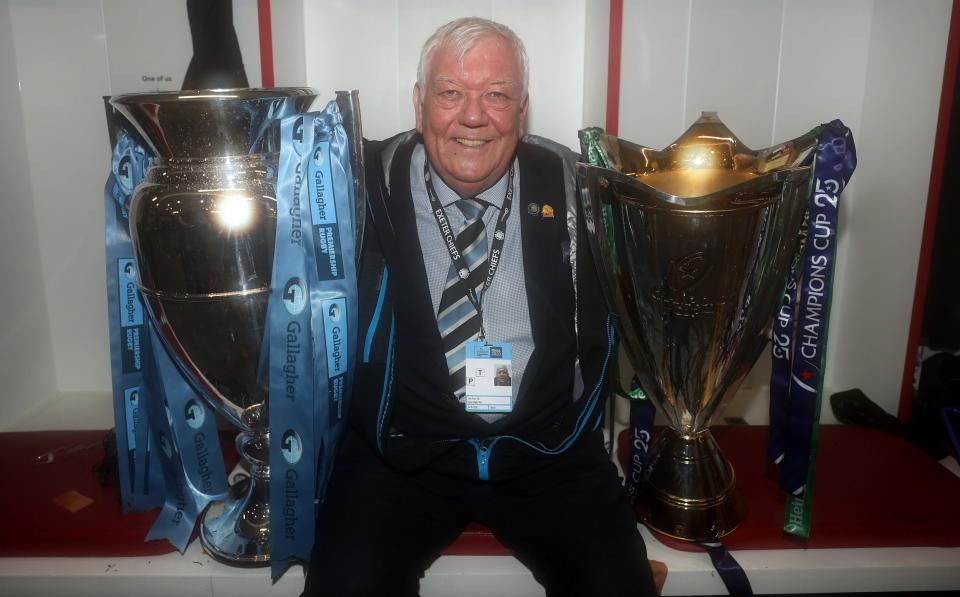 Tony Rowe with the Premiership and Champions Cup trophies - GETTY IMAGES