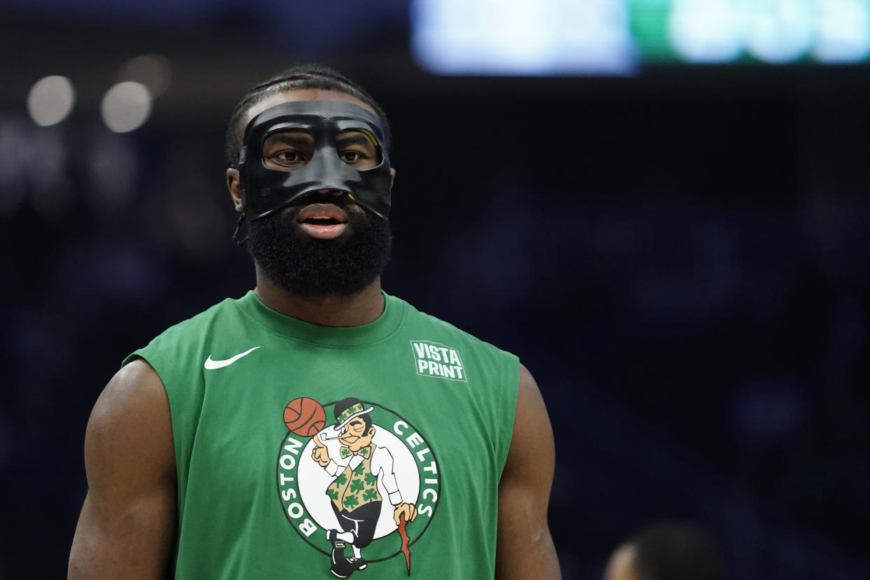 Boston Celtics' Jaylen Brown warms up before an NBA basketball game against the Milwaukee Bucks Thursday, March 30, 2023, in Milwaukee. (AP Photo/Aaron Gash)