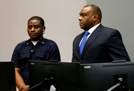 FILE PHOTO: Jean-Pierre Bemba Gombo of the Democratic Republic of the Congo stands in the courtroom of the International Criminal Court (ICC) in The Hague, June 21, 2016. REUTERS/Michael Kooren/File Photo