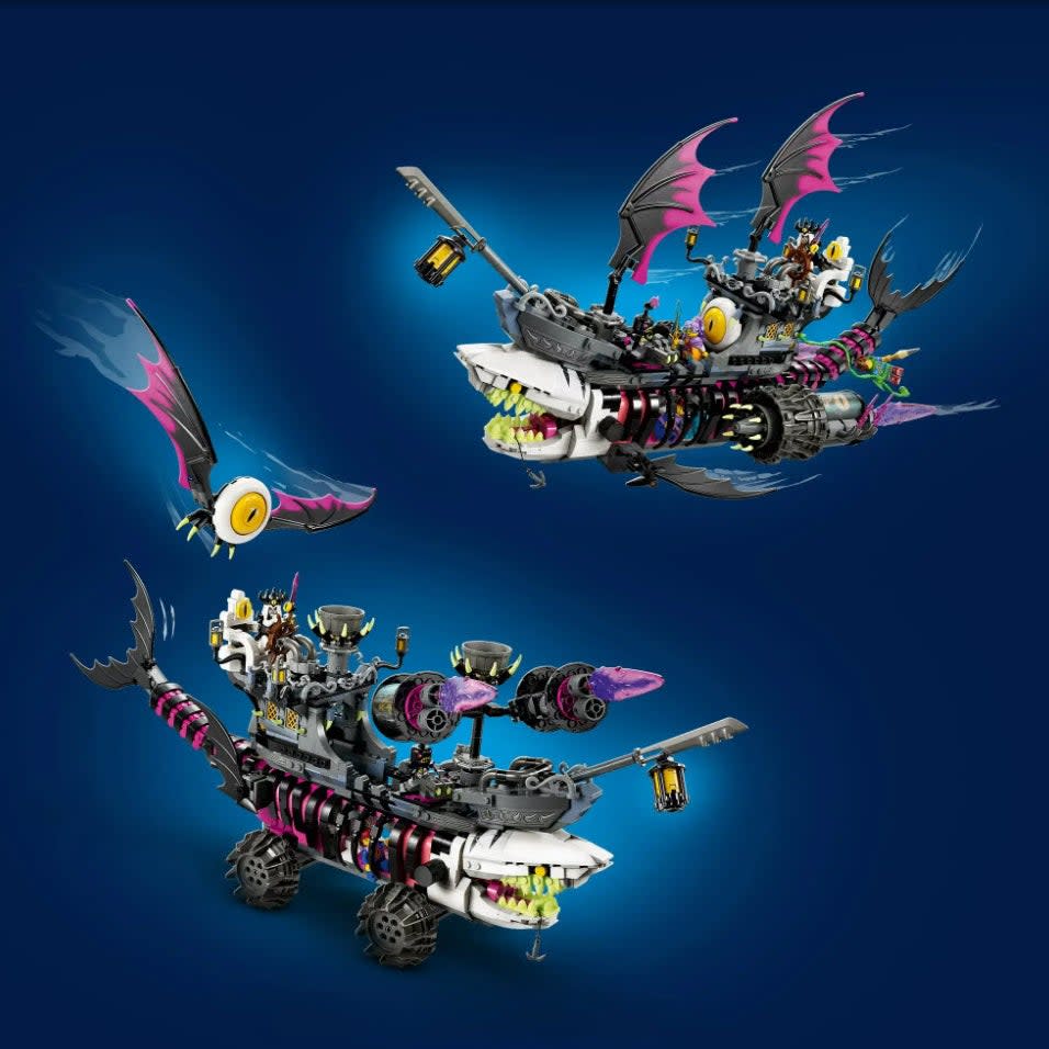 Lego set of shark ship with wheels, wings and other pieces